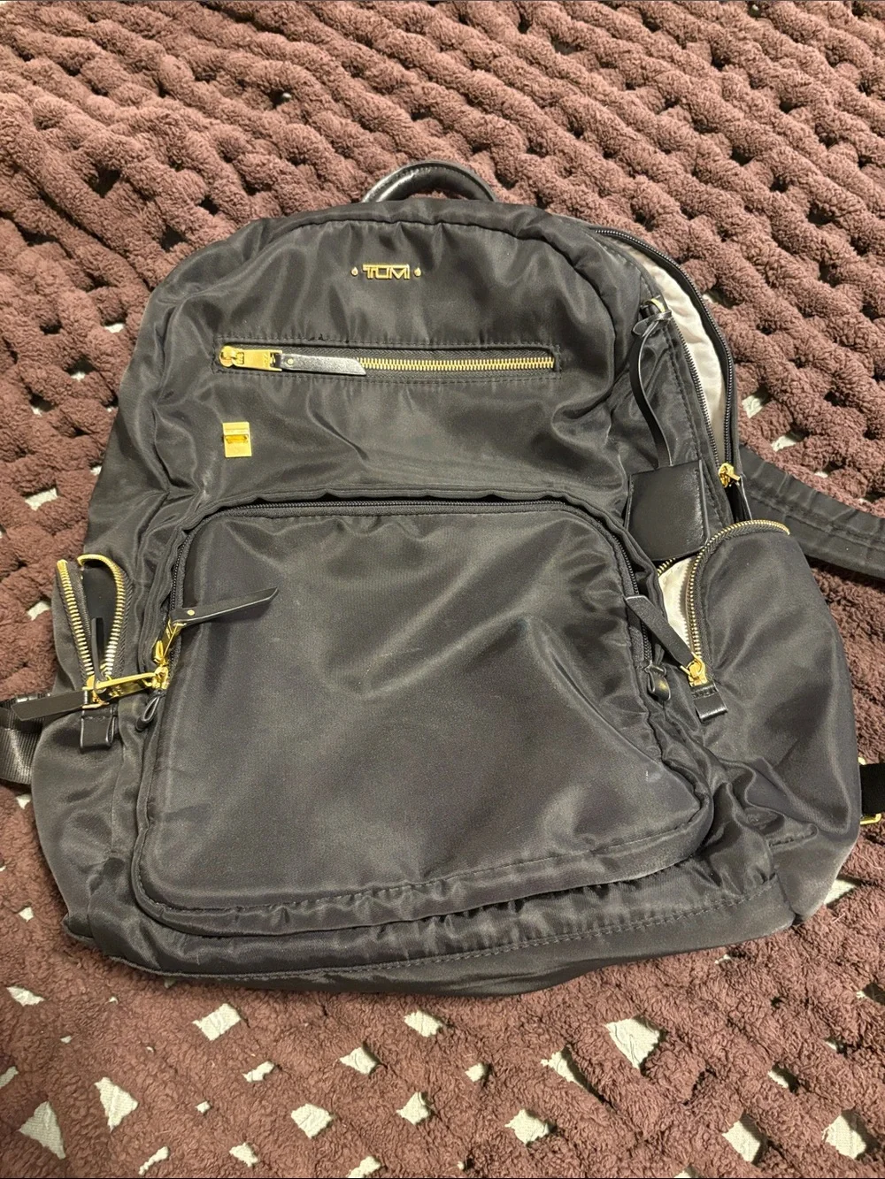 Tumi Black Nylon Backpack with Gold Hardware Accents